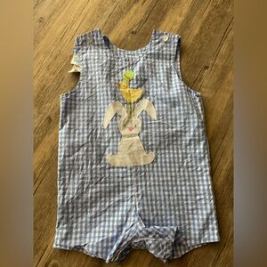 Blue and white reversible shortall offering truck and Easter bunny!